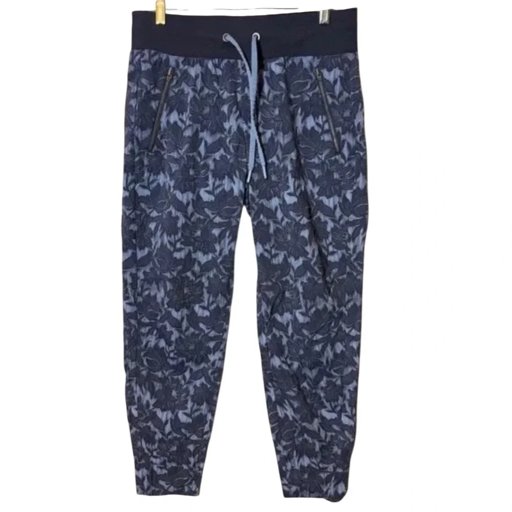 Athleta La Viva Jogger Pants Navy Blue Floral Jacquard Zip Pockets Womens Size 2